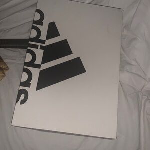 New in box men’s Adidas.